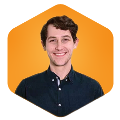 Damon Paul has brown hair and is wearing a black shirt. They are a Solutions Architect at mabl.