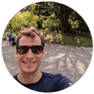 Logan Miles has brown hair and is wearing sunglasses and a blue shirt. He is a platform engineer with Buildit Wipro Digital.