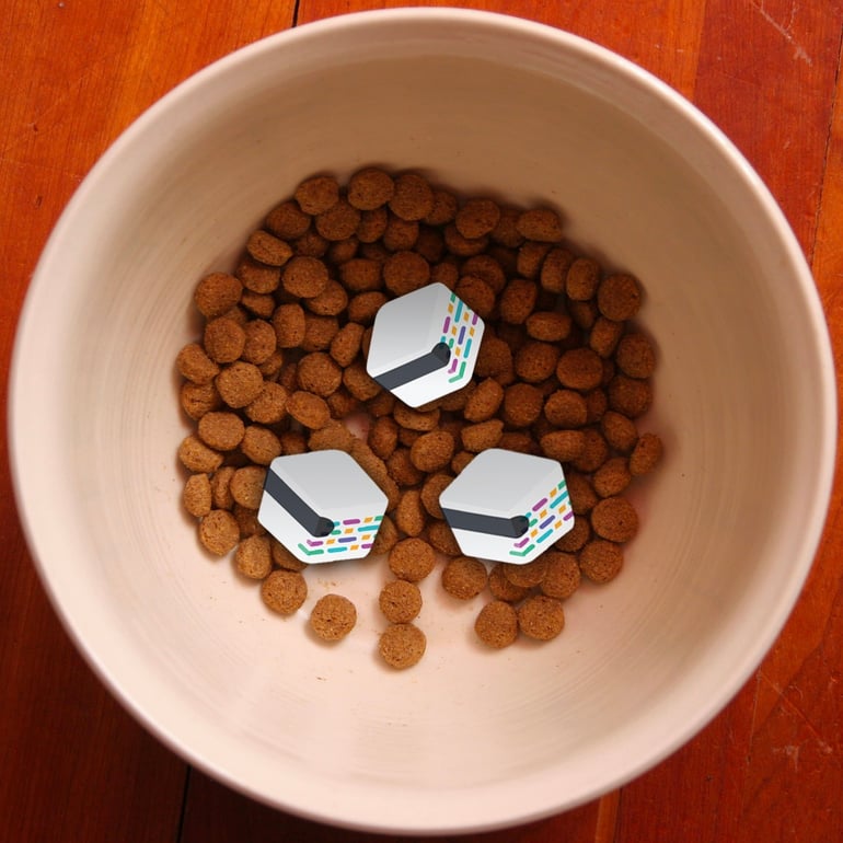 3 mabl logos in a bowl of dog food.