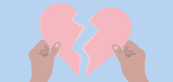 Hands holding 2 pieces of a broken heart.