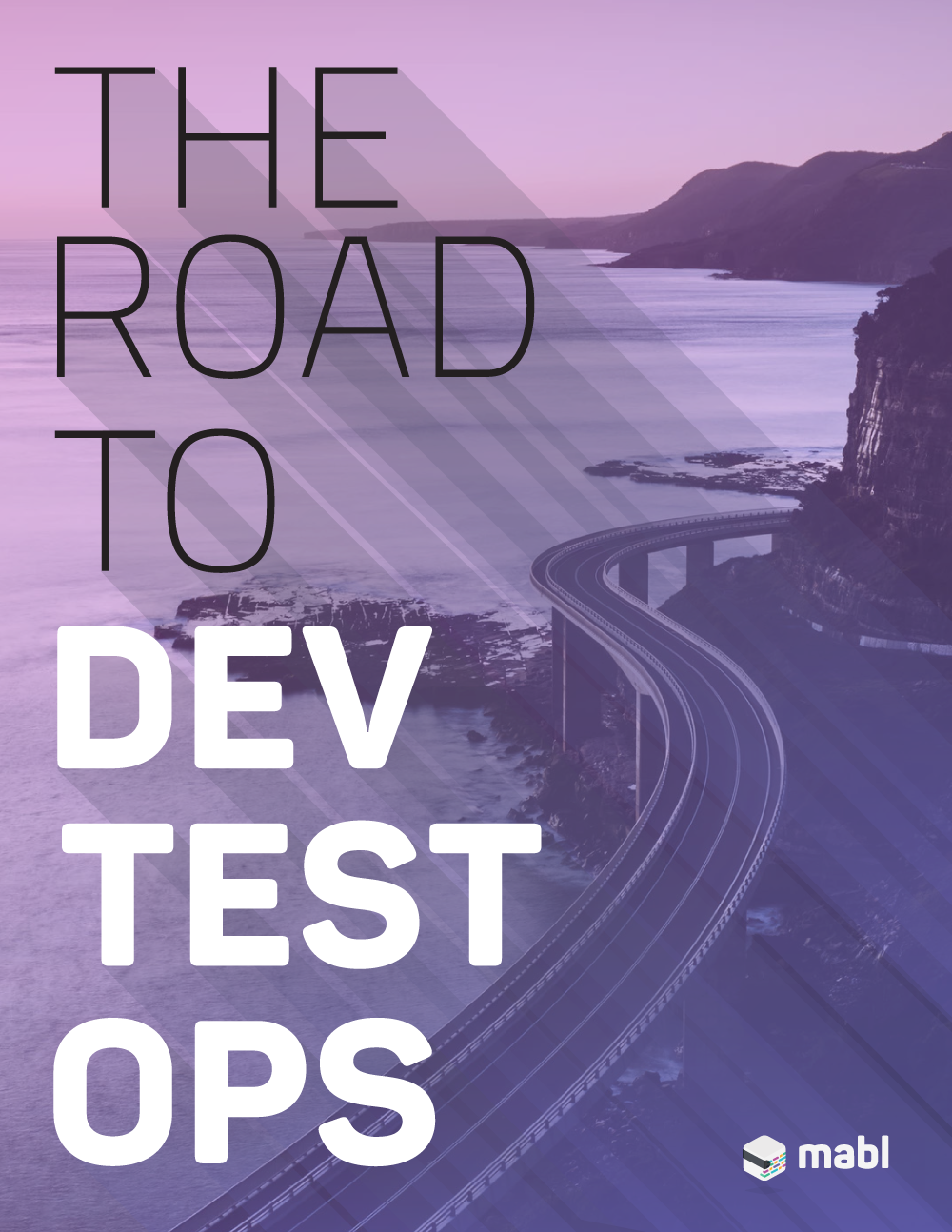 The words the road to dev test ops over a picture of an elevated highway along a rocky shoreline.